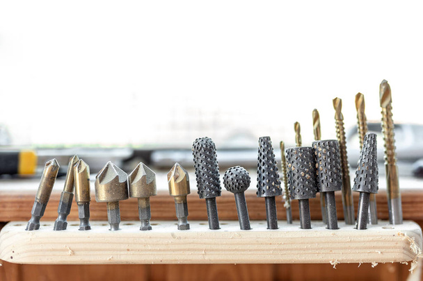 Close-up woodwork tool set. Rasp-file burr countersink kit. Carpentry woodworking workshop concept. - Photo, Image