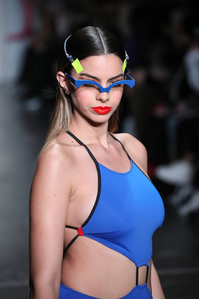 NEW YORK, NY - FEBRUARY 09: A model walks the runway for Chromat during New York Fashion Week: The Shows at Industria Studios on February 9, 2018 in New York City.  - Foto, Imagen