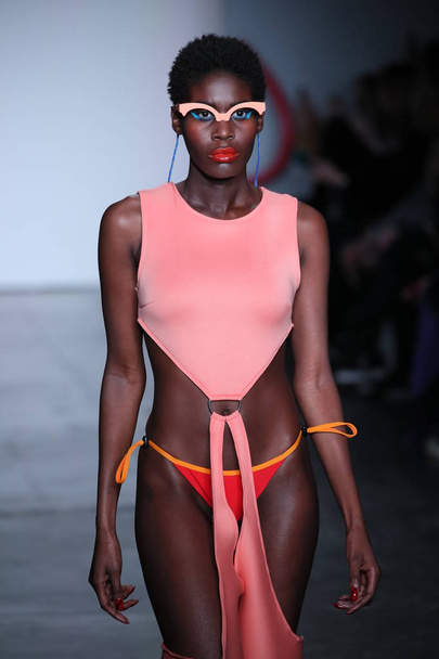 NEW YORK, NY - FEBRUARY 09: A model walks the runway for Chromat during New York Fashion Week: The Shows at Industria Studios on February 9, 2018 in New York City.  - Фото, изображение