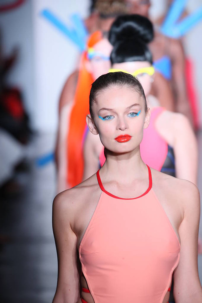 NEW YORK, NY - FEBRUARY 09: Models walk the runway finale for Chromat during New York Fashion Week: The Shows at Industria Studios on February 9, 2018 in New York City.  - 写真・画像