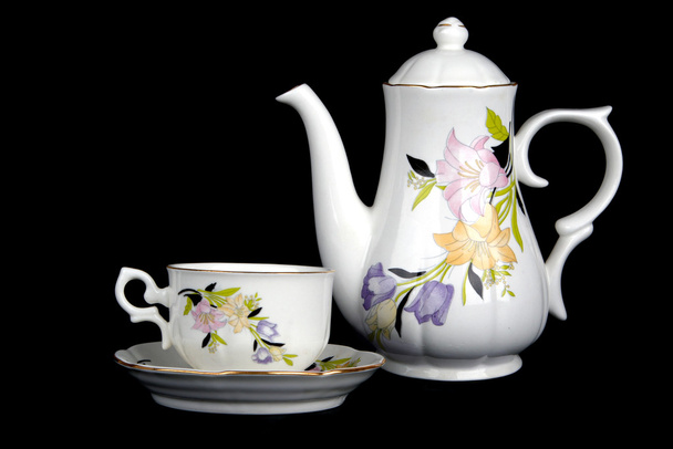 díszes porcelán csésze és a teáskanna - Fotó, kép