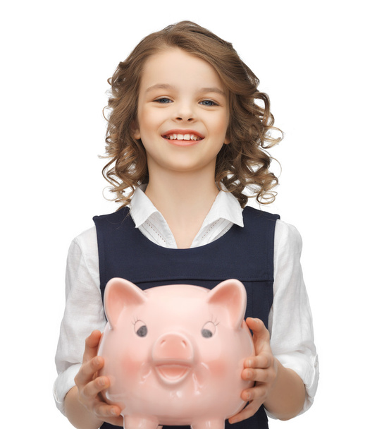 Girl with piggy bank - Foto, Imagen