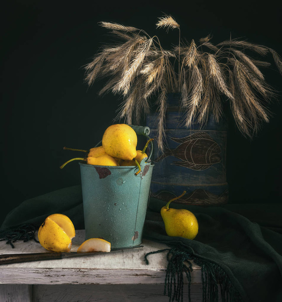 still life with pears and spikelets of wheat. vintage. retro. - Foto, Imagen