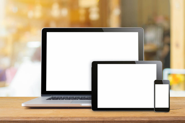 Laptop smartphone and tablet mockup with blank screen on table, Concept mockup. - Photo, Image