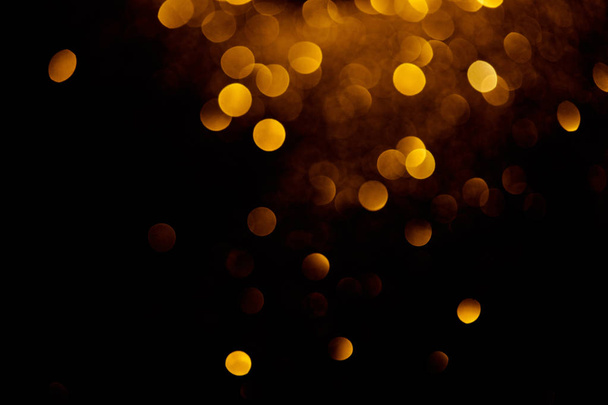 kultainen koriste bokeh mustalla taustalla
  - Valokuva, kuva