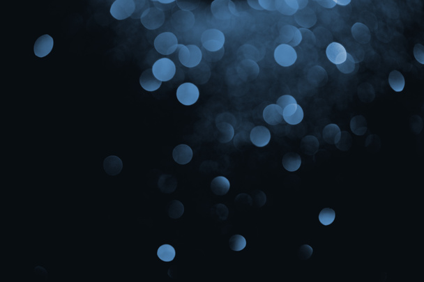sininen koriste bokeh mustalla taustalla
  - Valokuva, kuva