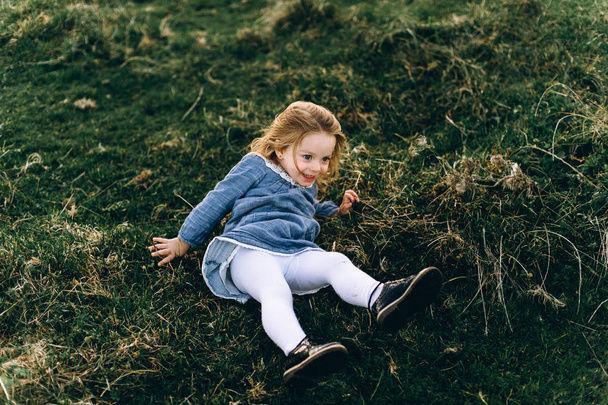  cute beautiful and happy girl having fun the sunny field  - Foto, Bild