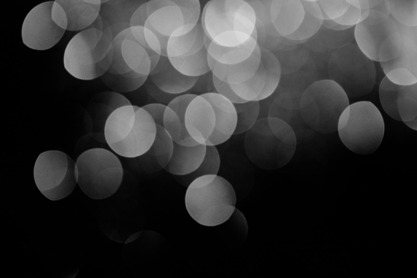 sparking silver festive bokeh on black background   - Photo, Image