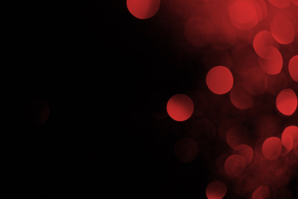 tmavé pozadí abstraktní s krásným červeným bokeh - Fotografie, Obrázek