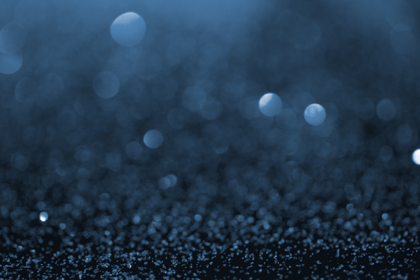 abstrakti sininen glitter bokeh taustalla
 - Valokuva, kuva