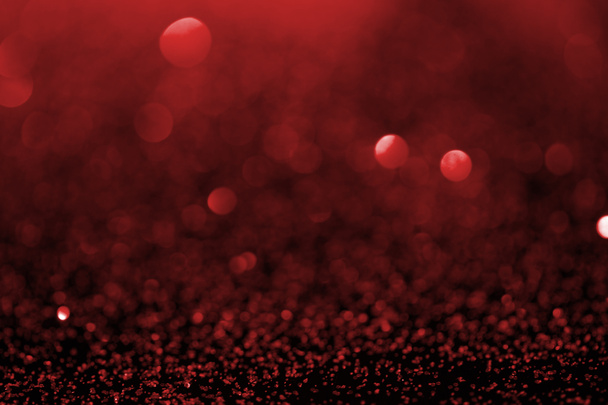 abstraktní pozadí s červenými třpytkami a bokeh - Fotografie, Obrázek