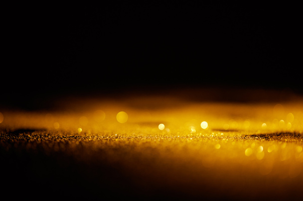 absztrakt fényes arany csillogó sötét háttér - Fotó, kép