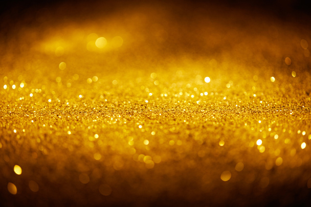 absztrakt fényes arany csillogó sötét háttér - Fotó, kép