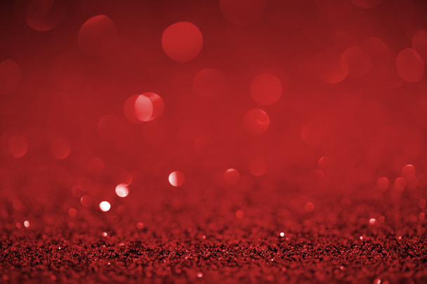 abstrakti punainen glitter bokeh taustalla
 - Valokuva, kuva