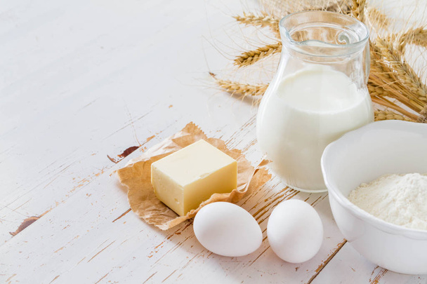 Ingredients for baking - milk, butter, eggs, flour, wheat - Fotografie, Obrázek