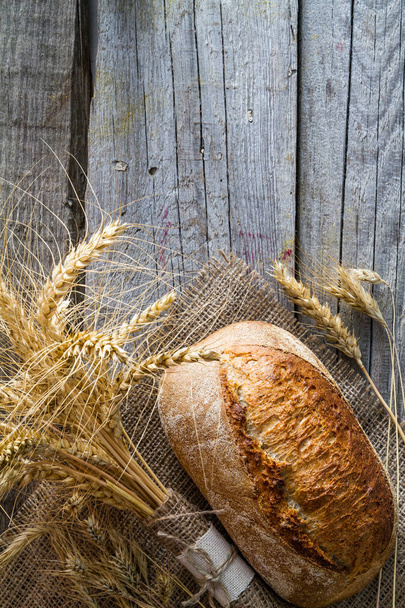 Bread, rye, wheat, rustic wood background - Zdjęcie, obraz