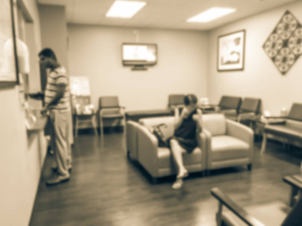 Vintage tono offuscata movimento pazienti check-in e in attesa presso l'ufficio ospedaliero centro medico, le cure primarie per la prevenzione sanitaria e il trattamento
 - Foto, immagini