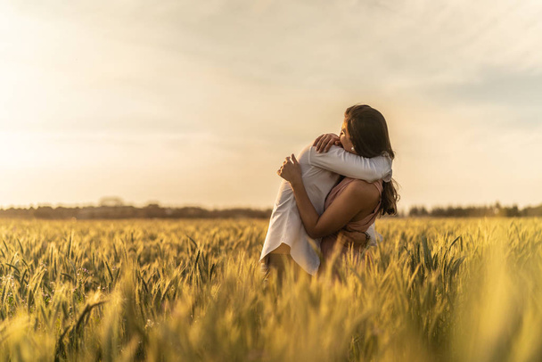 Romantic Couple on a Love Moment at gold wheat field - Holambra, Sao Paulo, Brazil - Фото, зображення