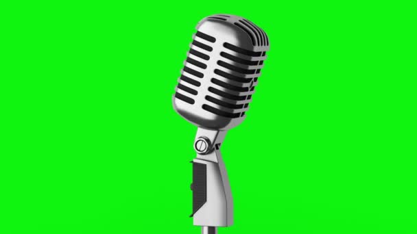 vintage microphone loop rotate on green chromakey background - Materiał filmowy, wideo