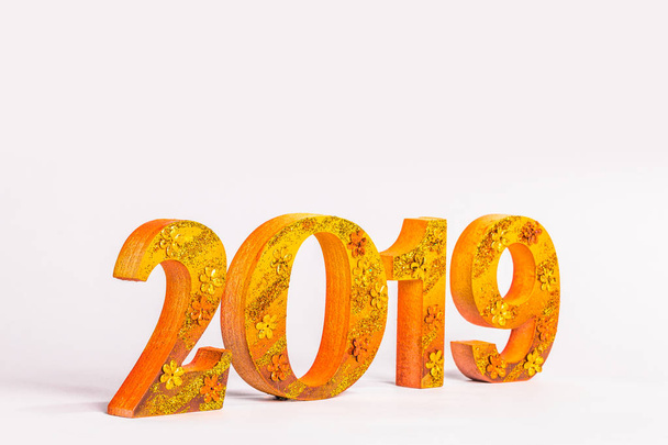 happy new year 2019 with gold writing in white background - Foto, afbeelding