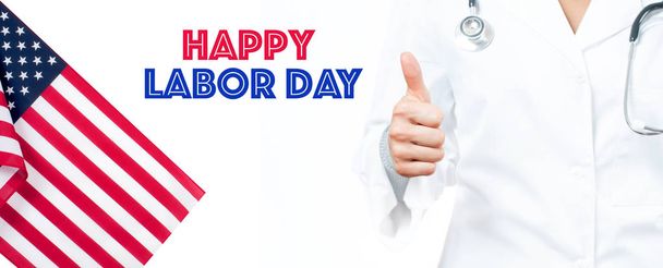Happy Labor Day. United States flag. Doctor showing thumb up on white background - Zdjęcie, obraz