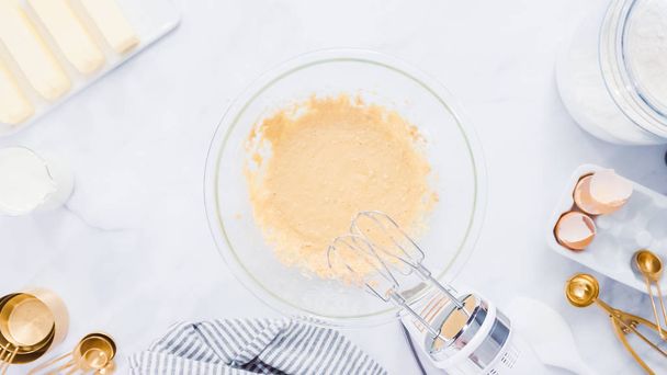 Step by step. Mixing ingredients for vanilla cupcakes. - Photo, Image