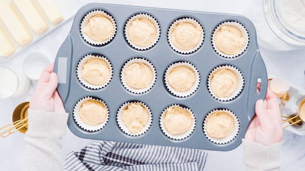 Step by step. Baking vanilla cupcakes in metal cupcake pan. - Photo, Image