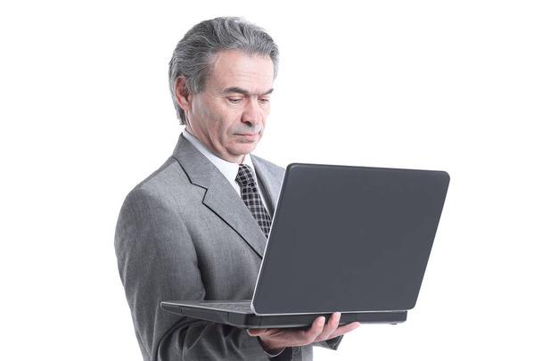 close up.adult businessman looking at laptop screen.isolated on white background - Foto, Imagen