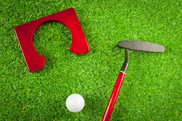 Mini golf equipment on green grass  - Zdjęcie, obraz