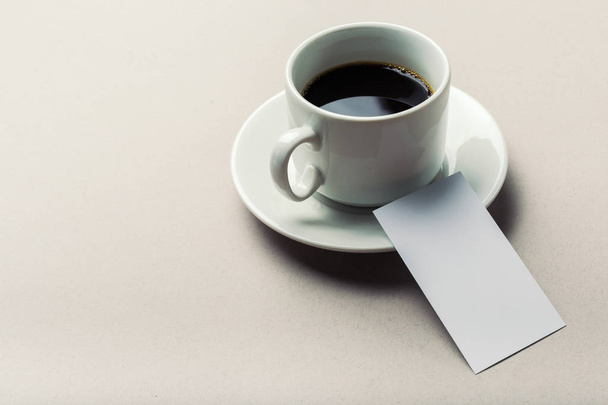 Blank card with coffee cup, close-up  - Zdjęcie, obraz