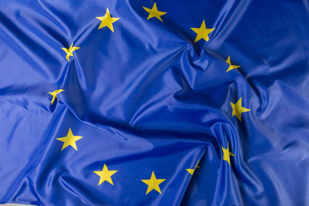 close up view of wavy flag of European Union - Foto, Bild