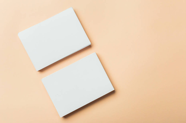 paper blank business cards on beige background, close-up  - 写真・画像