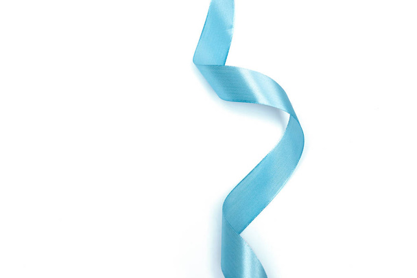 Shiny blue ribbon isolated on white background, close-up  - Φωτογραφία, εικόνα