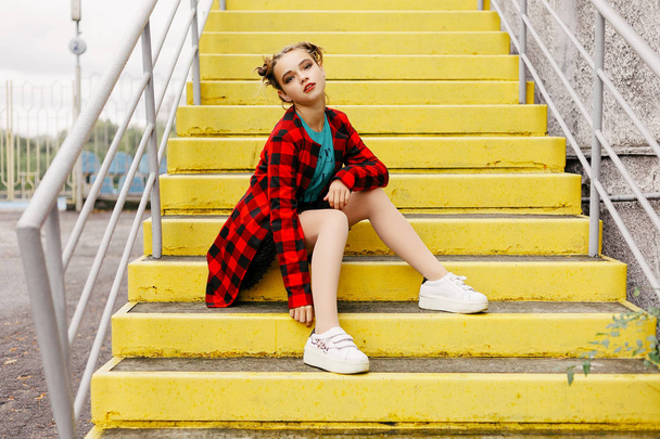 High fashion look. glamor stylish beautiful young woman model with red lips in summer bright colorful hipster cloth - 写真・画像