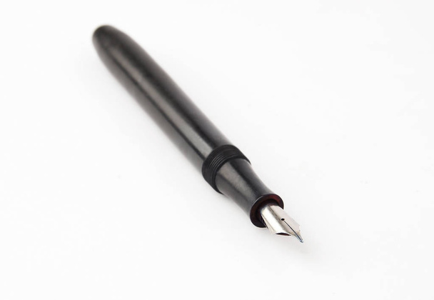 Antique ink pen, isolated on white background - Photo, Image