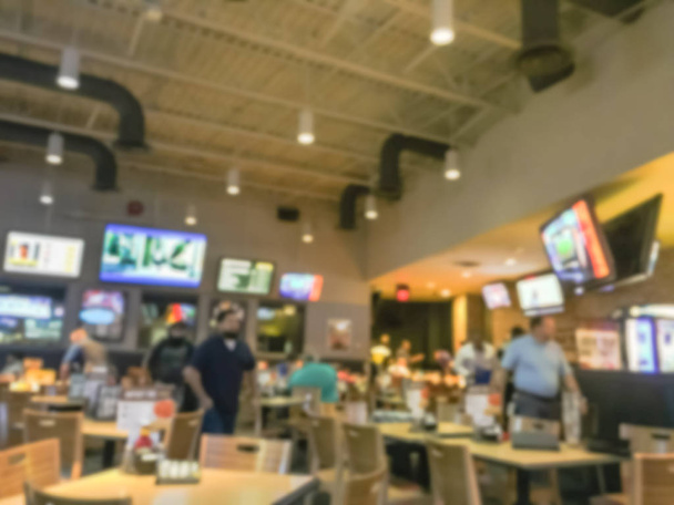 Bulanık soyut barlar restoranlar ABD spor. Ufuk kişi spor izle, bira içmek ve Amerikan mutfağı yemek - Fotoğraf, Görsel