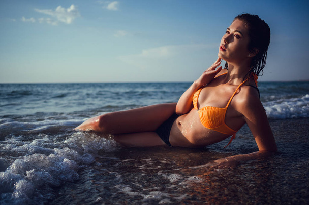 Summer beach vacation holidays woman happy joyful and laughing. Summer travel getaway concept with multiracial Asian Chinese / Caucasian woman in bikini in the sun - Foto, immagini