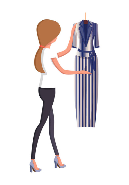 Mulher escolhendo o terno novo da voga do verão com calças
 - Vetor, Imagem