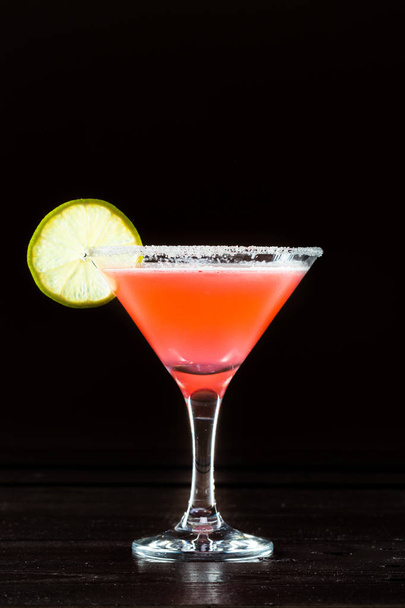 Red Cocktail in glass on black background - Фото, изображение