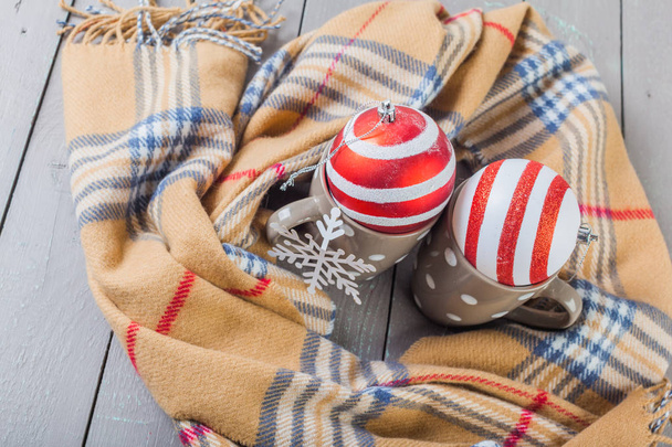 close up of warm scarf with mugs - Φωτογραφία, εικόνα