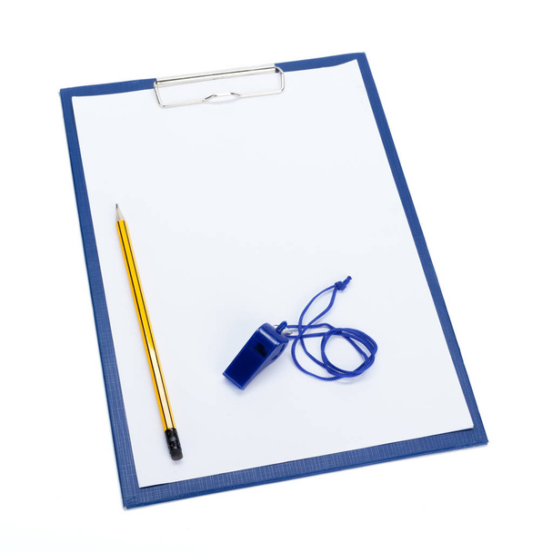 blank clipboard and coaches whistle with copy space - Фото, изображение