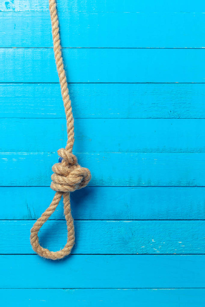ship rope on blue wooden background - Фото, зображення