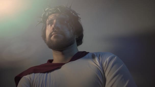 Jesus Christ with crown of thorns portrait - Materiał filmowy, wideo