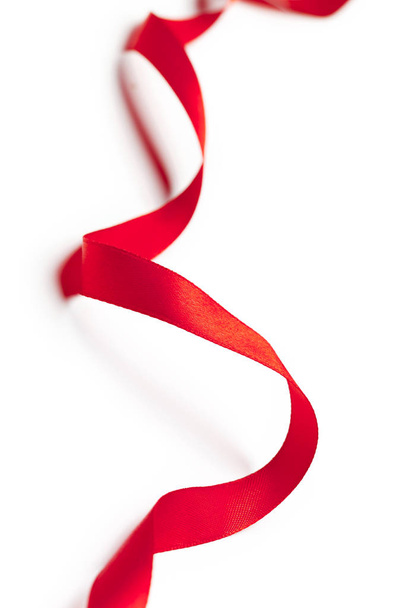 Red ribbon on white background - Фото, зображення