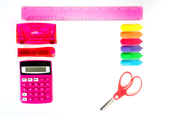 white school background with a pencil calculator ruler and felt-tip pens - Photo, Image