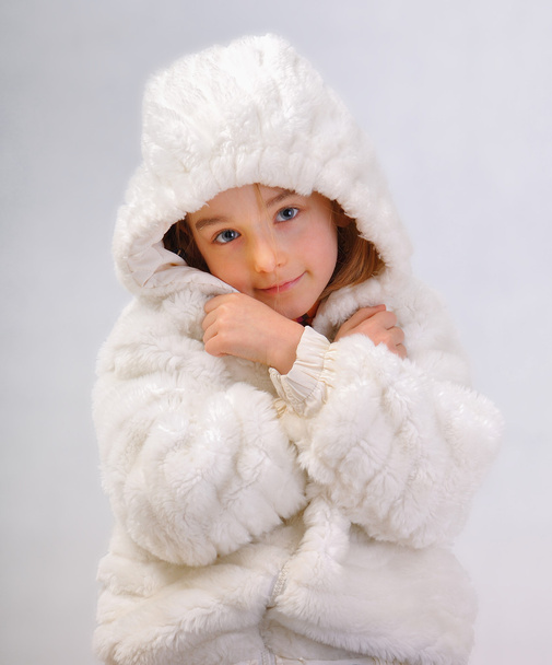 Little girl in white winter coat - Foto, Imagem