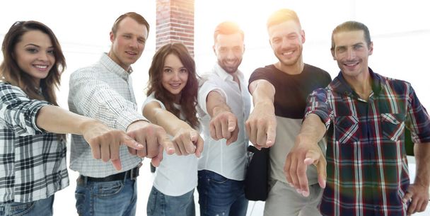 members of the business team pointing his arms forward.the concept of purpose. - Photo, Image