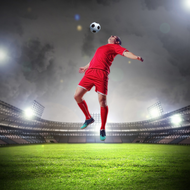 football player striking the ball - Fotó, kép