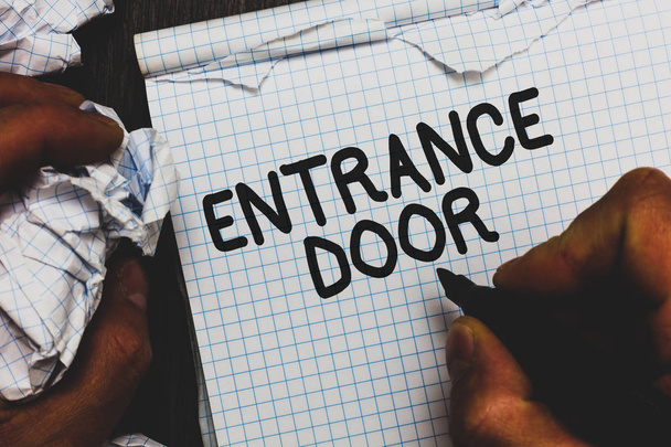 Handwriting text Entrance Door. Concept meaning Way in Doorway Gate Entry Incoming Ingress Passage Portal Man holding marker notebook crumpled papers ripped pages mistakes made. - Photo, Image