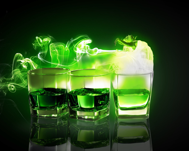 Three glasses of green absinth - Foto, Imagen